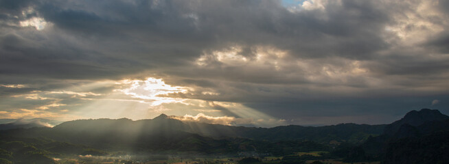 Banner Beautiful Mountain landscape foggy mountain green landscape morning sunrise. Amazing Landscape mountain green tropical forest tree on sunrise. Banner forest sunlight scenery with copy space