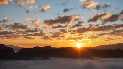Golden sky sunrise dramatic beautiful landscape view. Dawn sky gold dusk time cloudscape with sunlight. Dramatic sunset scenic landscape. Beautiful landscape sunshine nature