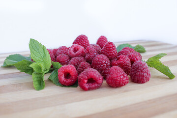 raspberries on a wooden table