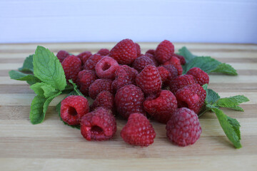 raspberries on a wooden table