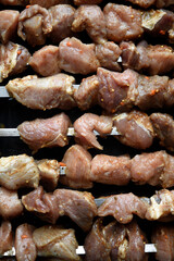 Raw pickled pork meat. Prepared for frying shish kebab.