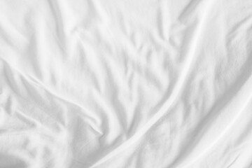 Fototapeta premium Abstract White Bedding Sheets or White wrinkled fabric background texture and Texture with copy-space :Creased or wrinkled white fabric,Soft focus