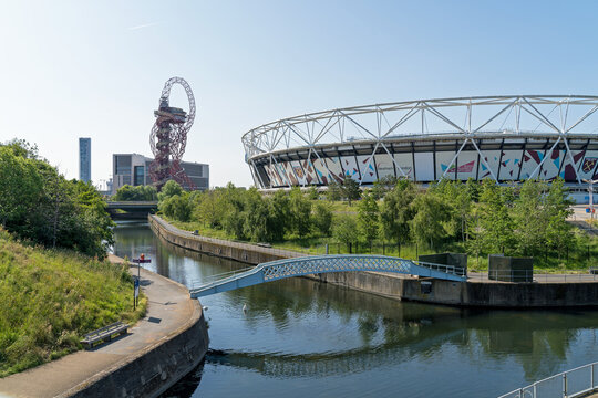 The Queen Elizabeth Olympic Park on a sunny day with the West Hams London Stadium in the distance. London - 4th June 2023