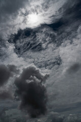 Dark rain cloud dramatic sky summer tropical thunder storm sky and fluffy black darkness cloud...
