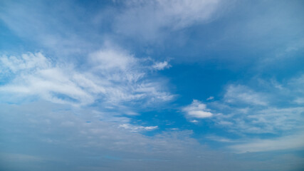 Tropical summer blue sky fluffy white cloud summertime on light sunny day cloudscape. Clear bright blue skyline spring sunlight climate background. Heaven blue environment ecology high scenic nature.