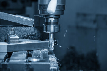 The side milling process on NC milling machine by flat nose end mill tool in the light blue scene.