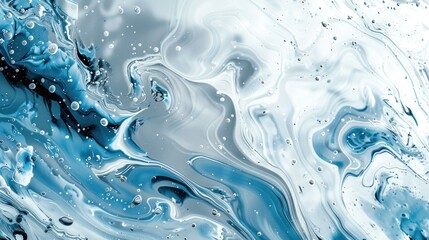 Abstract background with a silver and blue marble gradient, complemented by fluid ink and water textures.