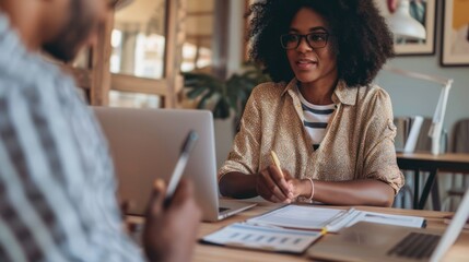 HR professional assisting an employee with benefits information.