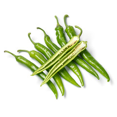 Heap of fresh whole and halved green Turkish Carliston peppers isolated on white background close up