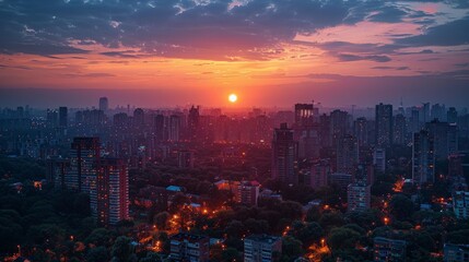 Fototapeta premium stunning sunset view over a city skyline, with the buildings bathed in golden light and the sky painted in hues of orange and pink. The serene and picturesque scene captures the end of a day.