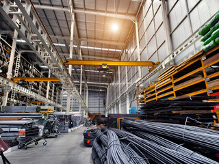 A big warehouse packed with numerous metallic nets and profile