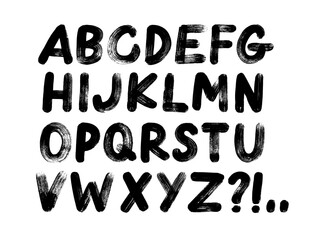 Typographic distressed font with dry brush strokes texture. Grunge graffiti style bold uppercase letters.