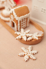 Delicious cookies in the shape of snowflakes are on the festive table