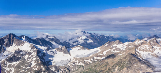 panoramic view of snowy high mountain peaks, Caucasus ridge.