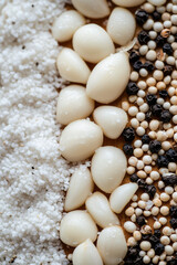 Grits Salt, peeled garlic cloves and black pepper peas. 