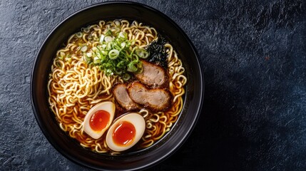 Top view of a delicious bowl of ramen with toppings, with ample space for text