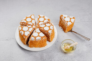 Homemade Russian layered honey cake sliced.