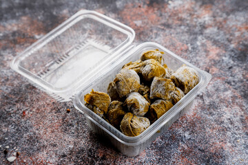 Dolma - stuffed grape leaves with rice and meat.