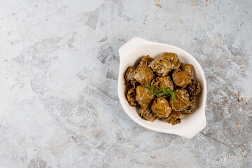Dolma - stuffed grape leaves with rice and meat.