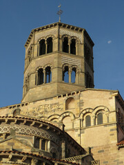 Fototapeta premium Abbey of Saint-Austremoine. 12th century. UNESCO World Heritage. View of the apse and bell tower. Historic city of Issoire. Auvergne. France.