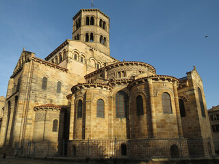 Abbey of Saint-Austremoine. 12th century. UNESCO World Heritage. View of the apse and bell tower. Historic city of Issoire. Auvergne. France.