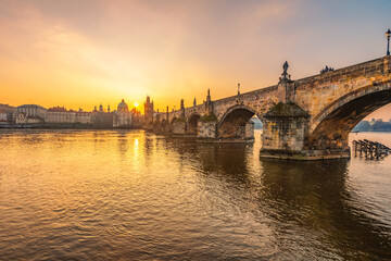 Obraz premium View of the city of Prague and the Vltava river with Old Town Bridge Tower on Charles bridge in Prague, Czech Republic.