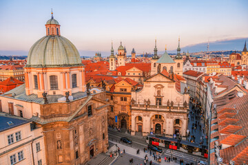Obraz premium View of the city of Prague city and Charles bridge from Old Town Bridge Tower in Prague, Czech Republic.