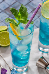 Refreshing blue curacao, vodka and lemonade cocktail