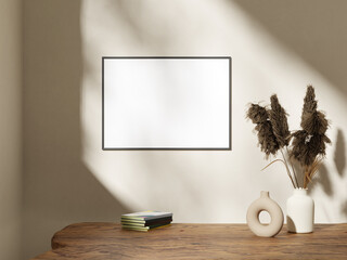 Empty framed canvas for mockups and art illustrations in minimalist room interior