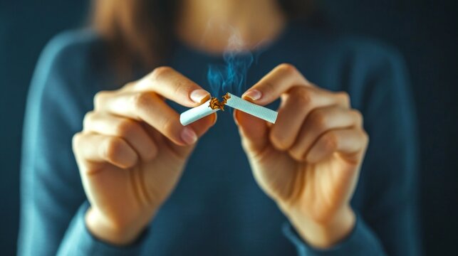 Woman breaking cigarette in half symbolizing quit smoking. The image promotes health and wellness. Modern and motivational photo. Perfect for campaigns, blogs, and articles on smoking cessation. AI