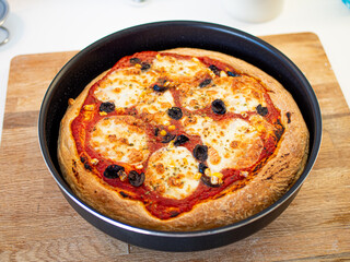 Fresh, hot, oven-baked Italian Neapolitan pizza with mozzarella cheese