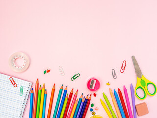 Back to school flat lay on a pink backgrounf
