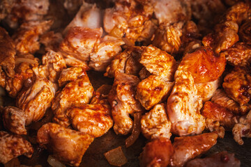 Cut the turkey meat into pieces and fry in a pan with red pepper and tomato sauce