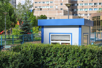 A small room at the entrance to a residential complex for a guard or security guard