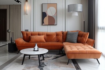 Peach velvet chaise lounge with black legs and white base in an elegant living room featuring modern furniture, abstract artwork, and soft lighting for a harmonious atmosphere.