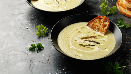 Asparagus and mint cream soup with sour dough toast bread