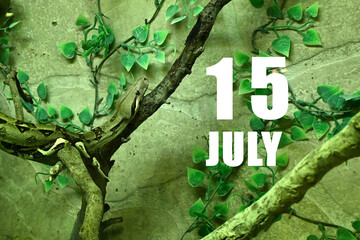 Calendar date on light green background with snake crawling on tree branch. July 15 is the...