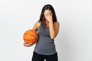 Young woman playing basketball over isolated white background with tired and sick expression