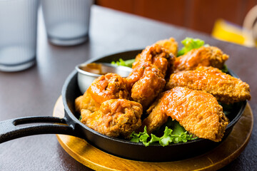 Deep fried chicken wing in restaurant