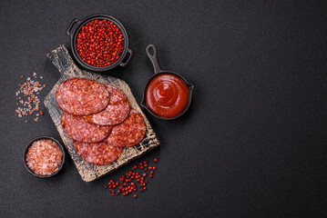 Delicious smoked pepperoni sausage sliced with salt, spices and herbs