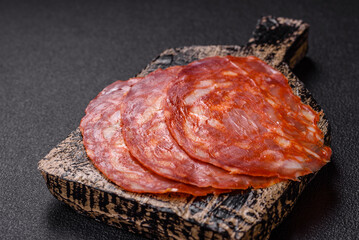 Delicious smoked meat sliced with salt, spices and herbs
