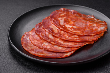 Delicious smoked meat sliced with salt, spices and herbs