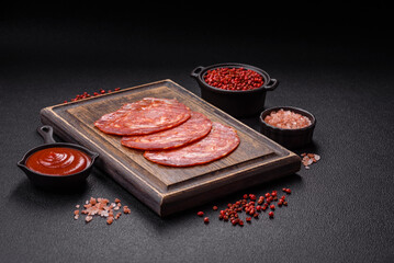 Delicious smoked meat sliced with salt, spices and herbs