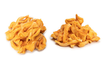Dried melon slices isolated on a white background.