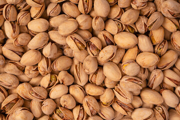 Tasty pistachios isolated on a white background.