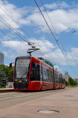 Nowoczesny tramwaj elektryczny na ulicach miasta. Katowice. Polska Modern electric tram on the city streets. Katowice. Poland    © jarizPJ