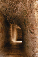 Obraz premium Durres,Albania, August 7,2024:inside the amphitheater of the city of Durres, the largest Roman amphitheater in the Balkans