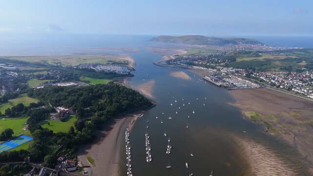 Coastal towns and forest around The Conwy River and estuary in North Wales. Great Orme in background