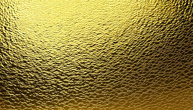 Golden textured background shining with light from above
