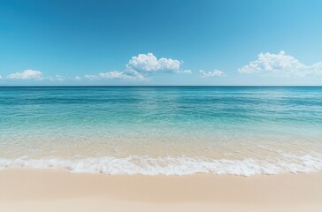sandy beach with the clear blue sea in background